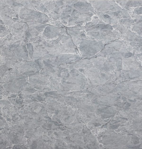 Premium engineered stone surface with natural marble-like veining, ideal for modern interiors and benchtop applications.